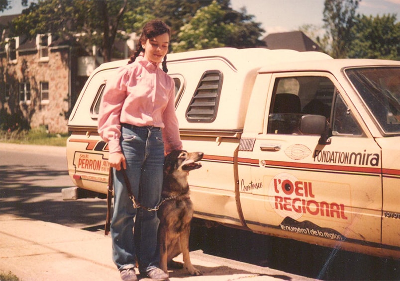 A historical photo of the first teenager who benefited from the service of guide dog